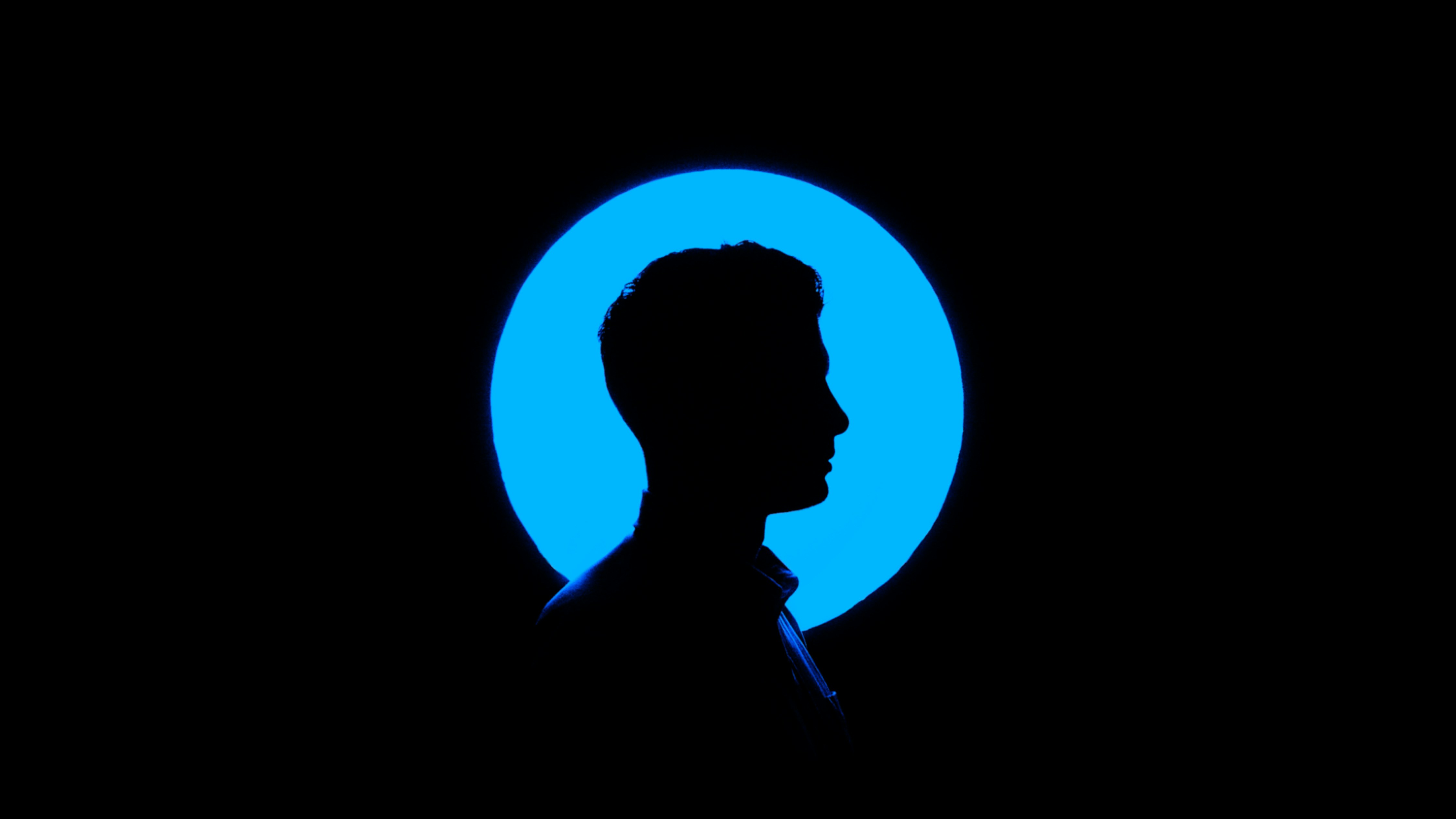 A young man with blue halo